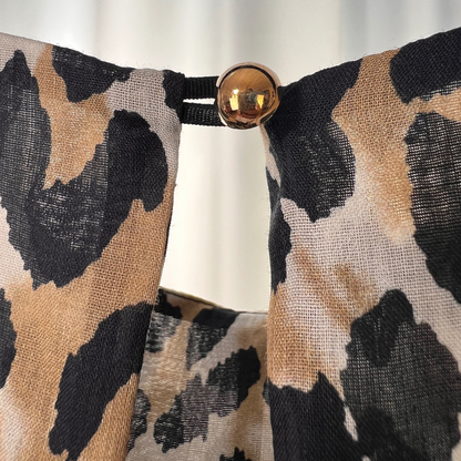 ÉCLAT SAUVAGE – Leopard Statement Jumpsuit